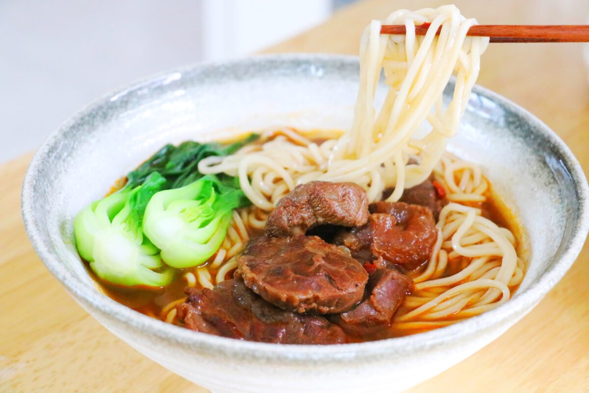 Bowl of Spicy Red Braised Beef Noodle Soup