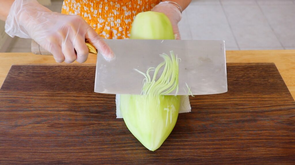 Thai Green Papaya Salad 1. Cut Papaya