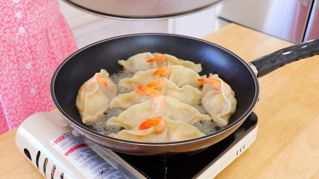 Pork and Shrimp Potstickers 8. Cook